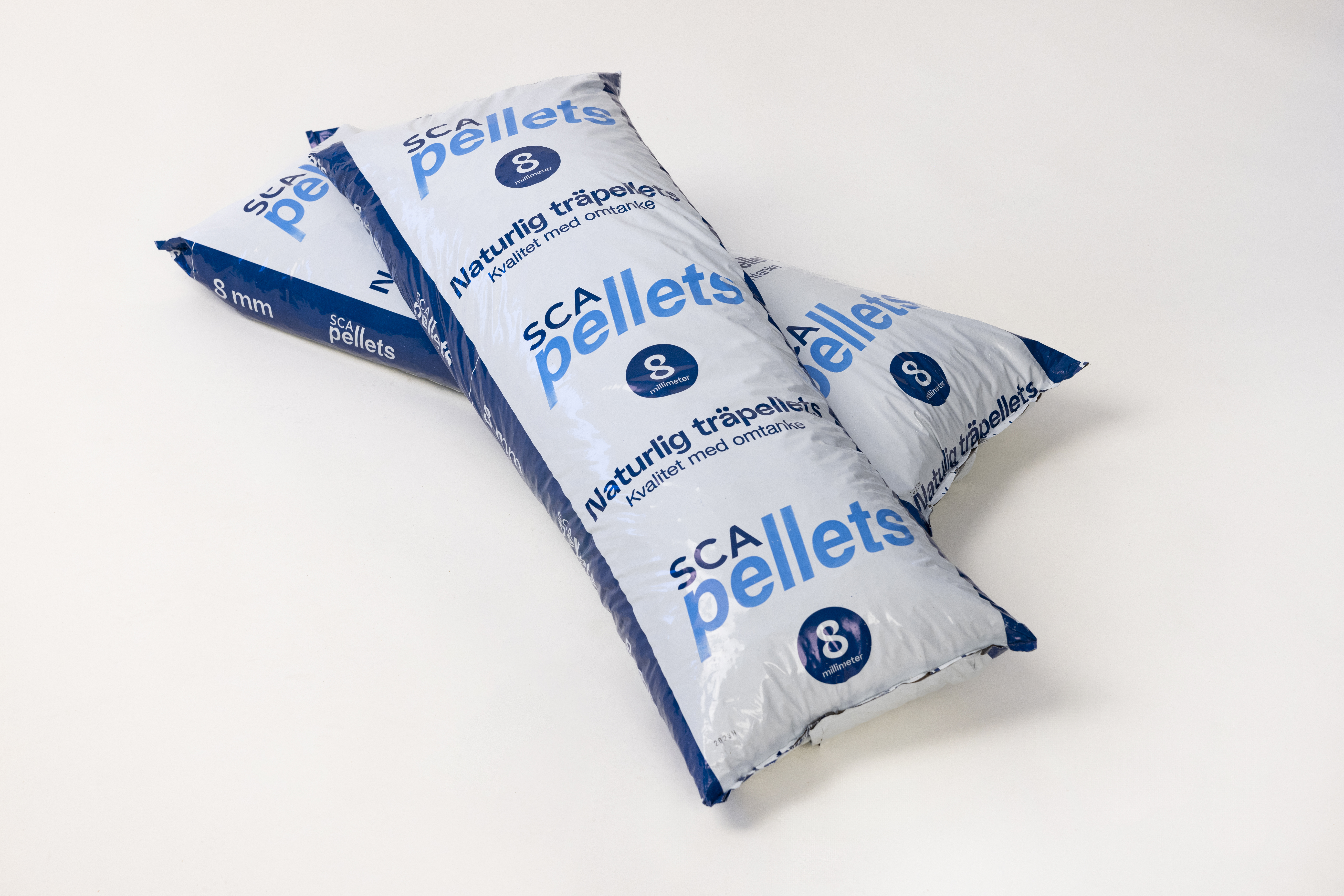 Pelletssäckar liggande i kors