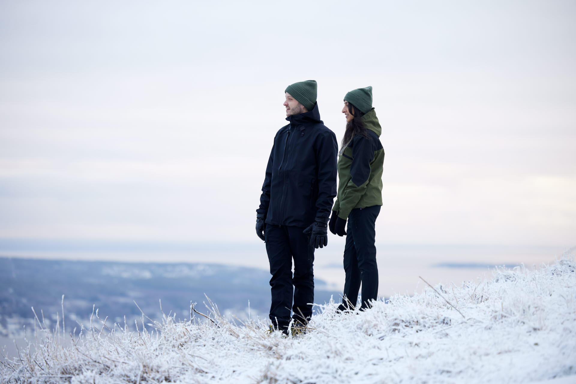 Two people in a winter landscape.