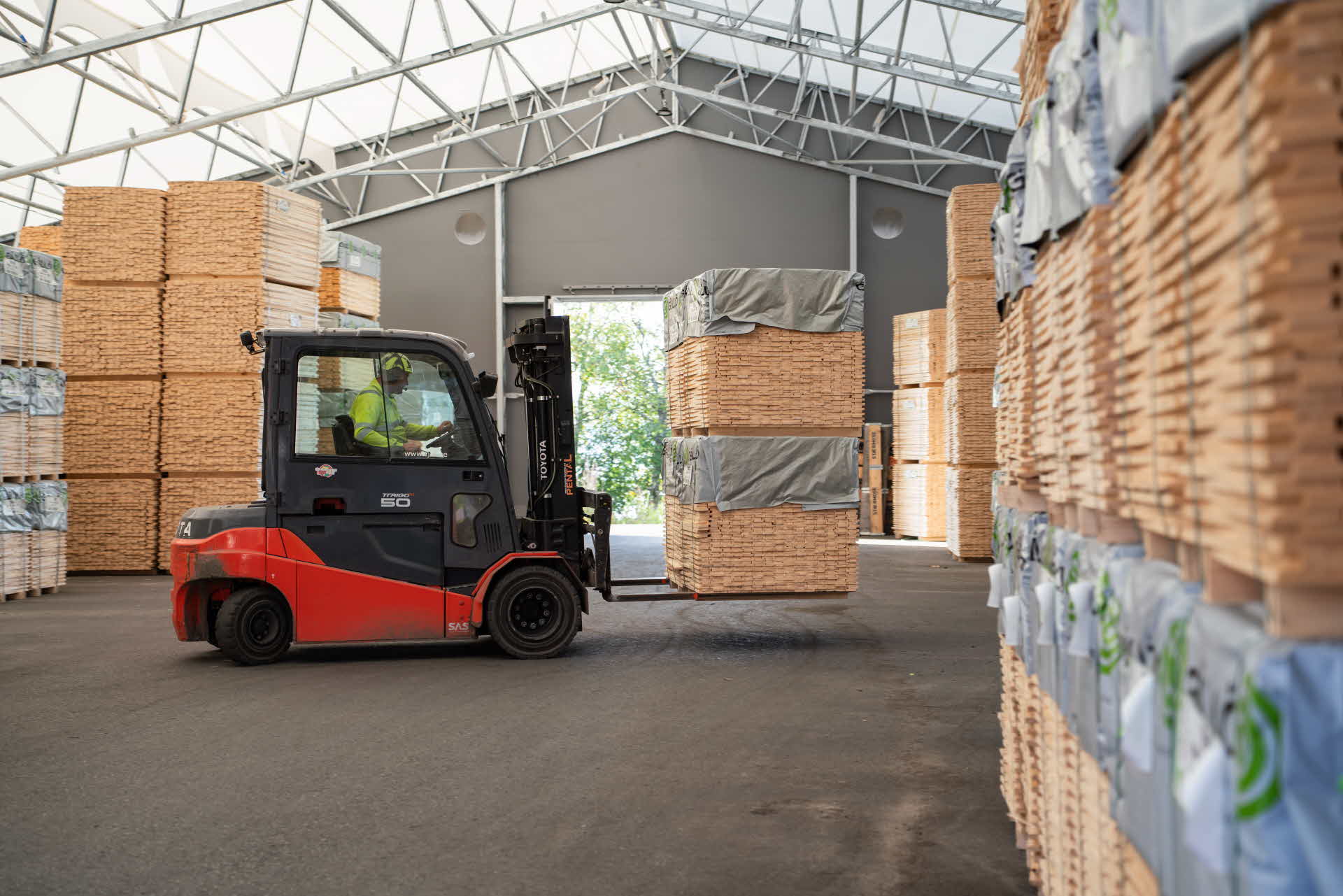 A truck transporting wood packages.