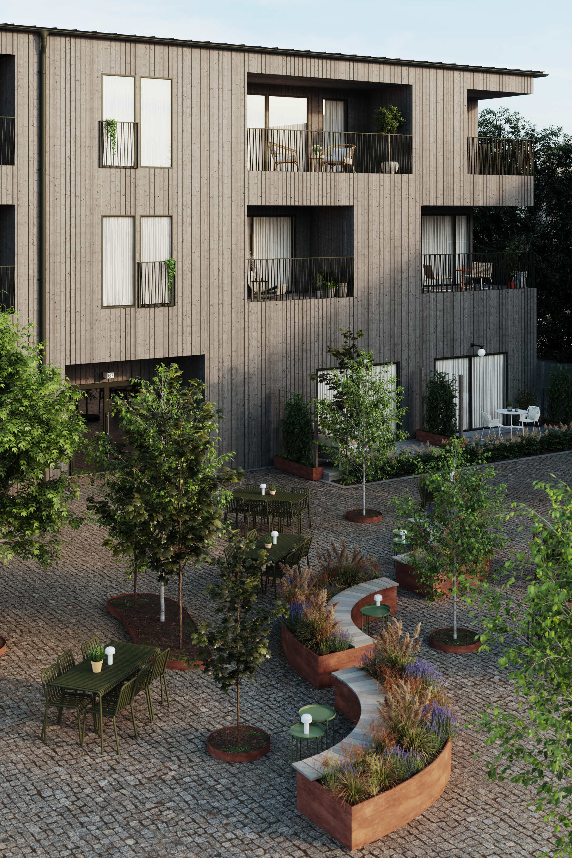 Ett flerfamiljshus klätt i en kärnfurupanel.