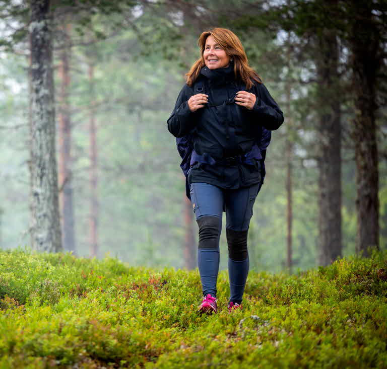 Woman walking in the forest