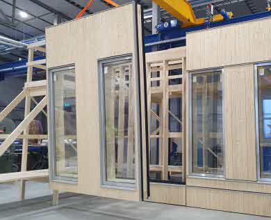 Fasadsystemet under tillverkning hos Norrlands trähus.