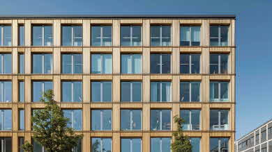 En fiktiv bild över ett modernt lägenhetshus, där det klimatsmarta fasadsystemet  hade varit ett bra alternativ att använda.