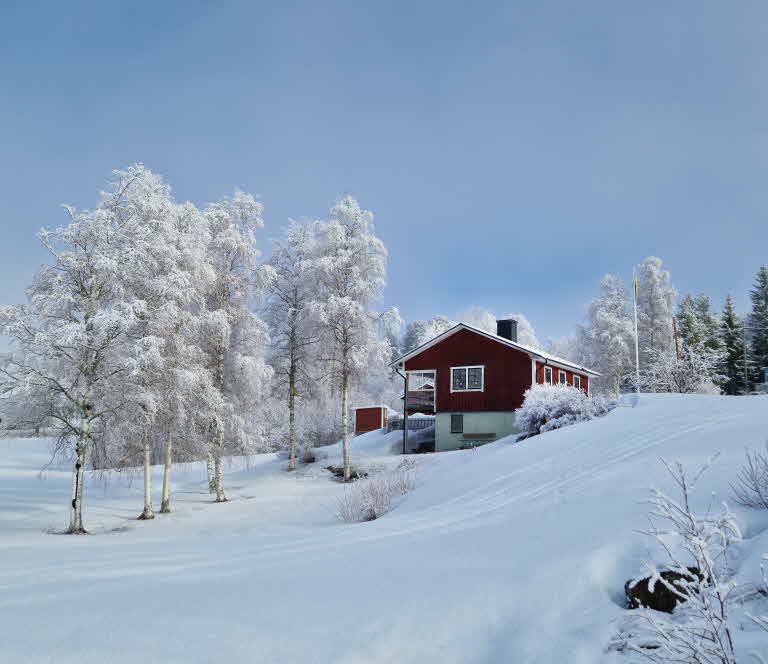 House in winter landscape